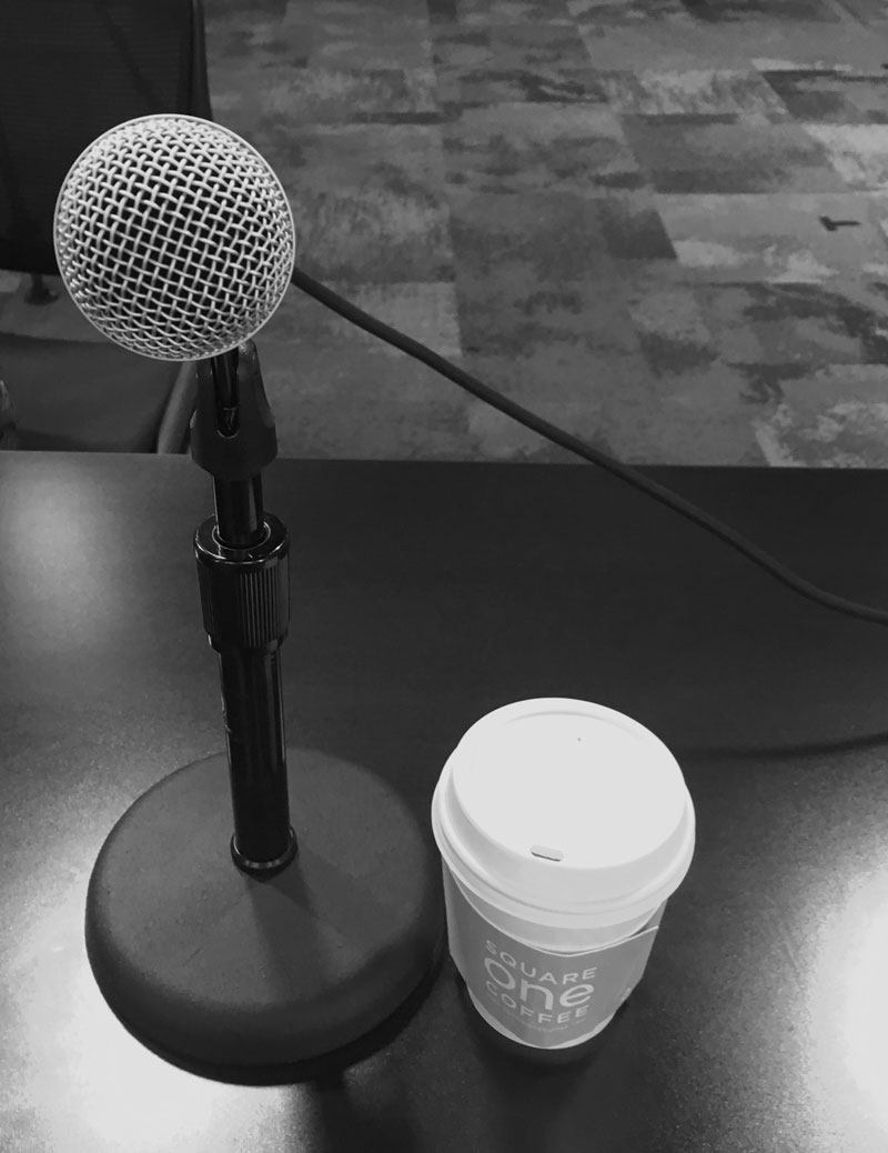 Photo of microphone and coffee