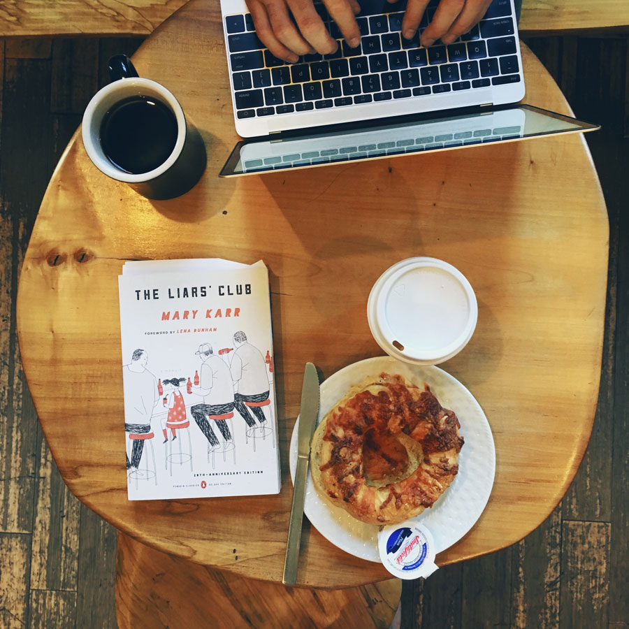 Liars' Club book on table at coffee shop